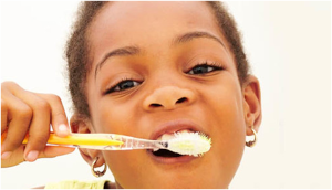 child brushing teeth